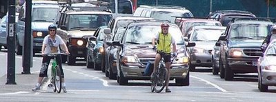 Transportation Secretary Ray LaHood gives cyclists a big happy bear hug